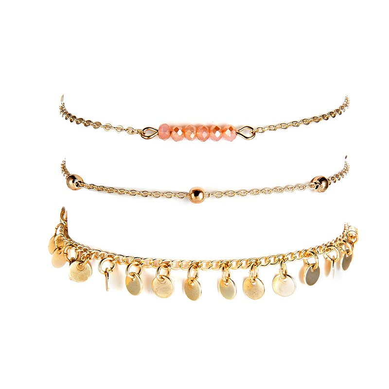 Lot de 3 bracelets dorés avec petits cristaux roses. Détails produit : Couleur or. Métal doré.