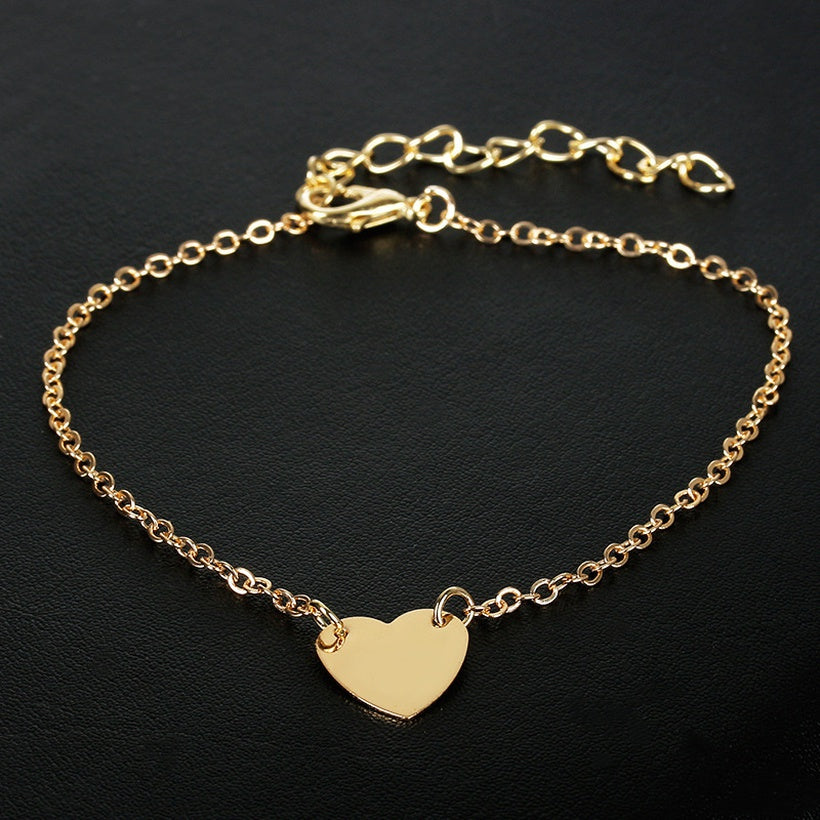 Bracelet doré pendentif coeur doré. Détails produit : Couleur or. Métal doré. Pendentif coeur doré.